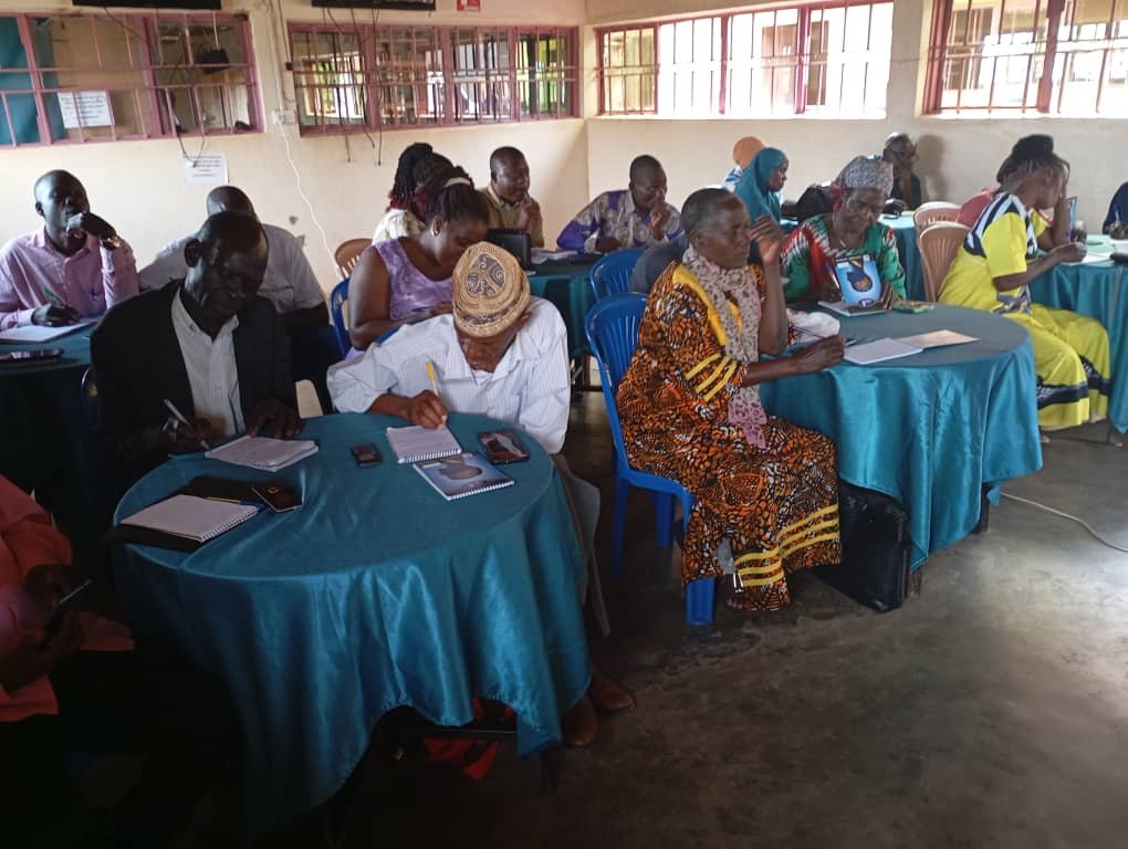 Women and men participating in a community program